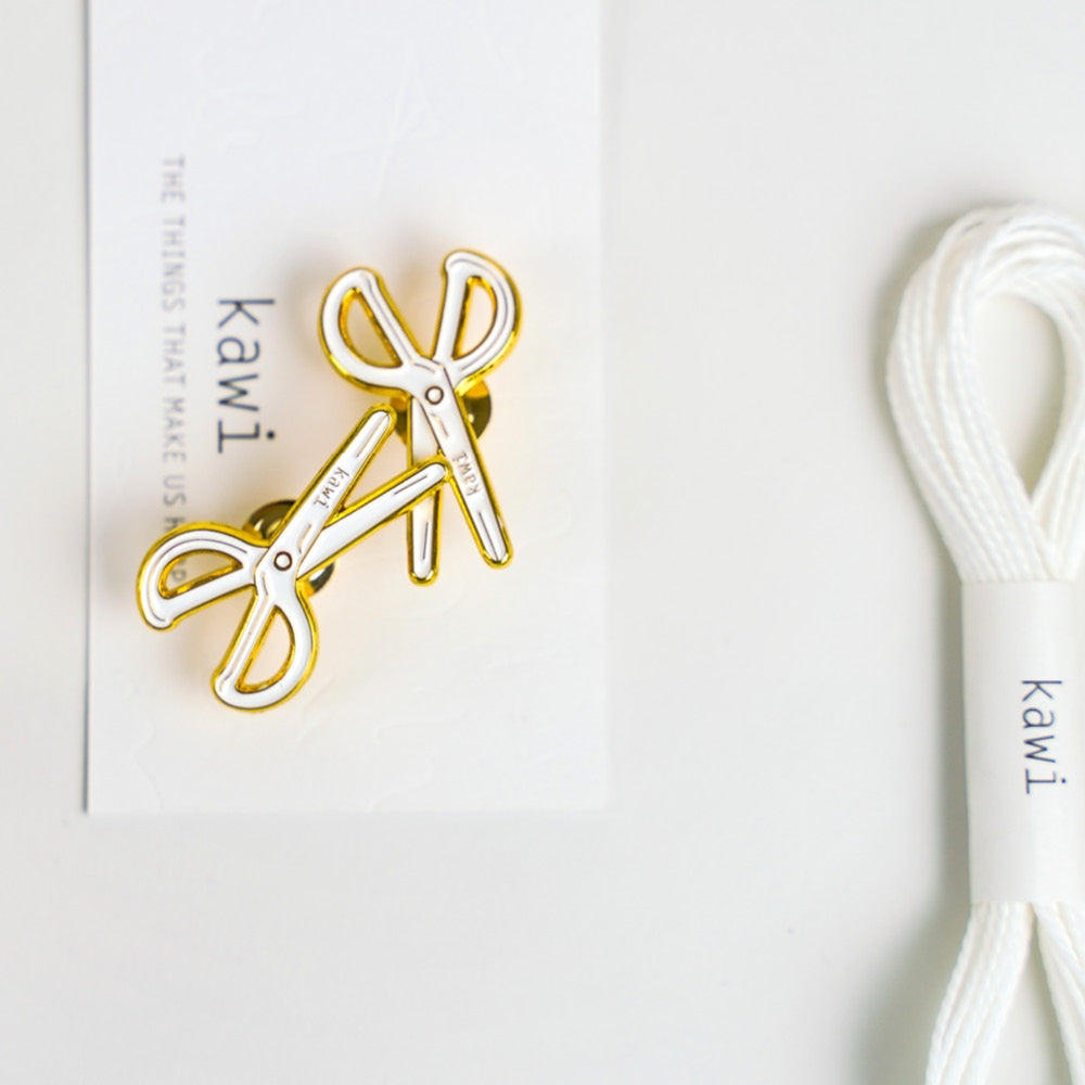White scissors pin by kawi