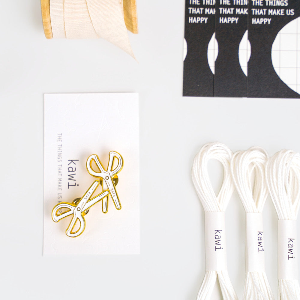 White scissors pin by kawi