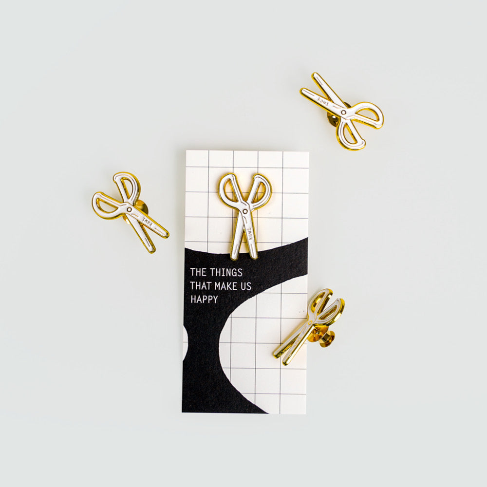 White scissors pin by kawi